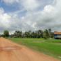 Cambodge - Une route a travers la campagne