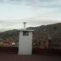 Bolivie - vue depuis le toit de notre hotel au soleil couchant. Vue sur le quartier El Alto, banlieue hyper pauvre de la paz : c joli de loin non ?
