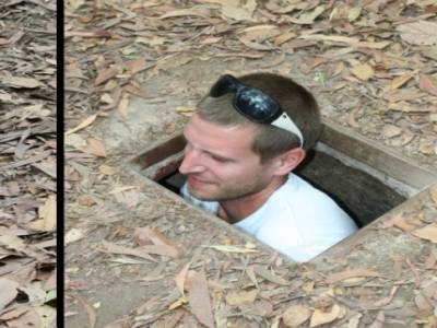 un Vietcong sortant de son trou