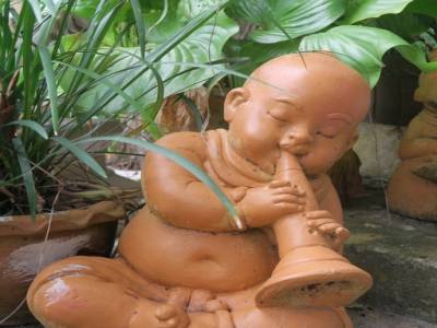 Petit bouddha à la trompette
