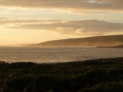 Couche de soleil au pied du phare d'Augusta