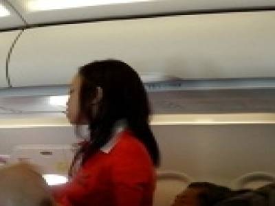 Dans l'avion de Kuala Lumpur